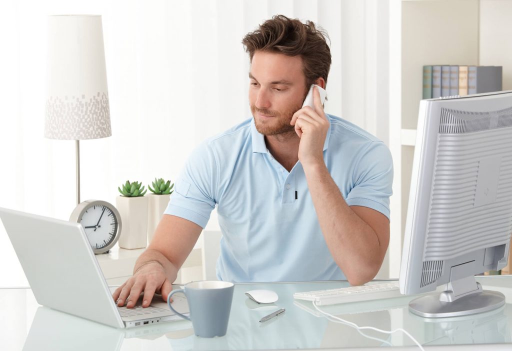 Man working from home on phone