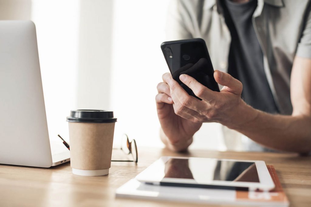 Woman working on phone