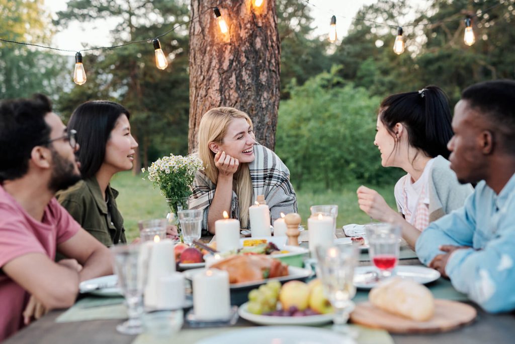 Friends dining outdoors