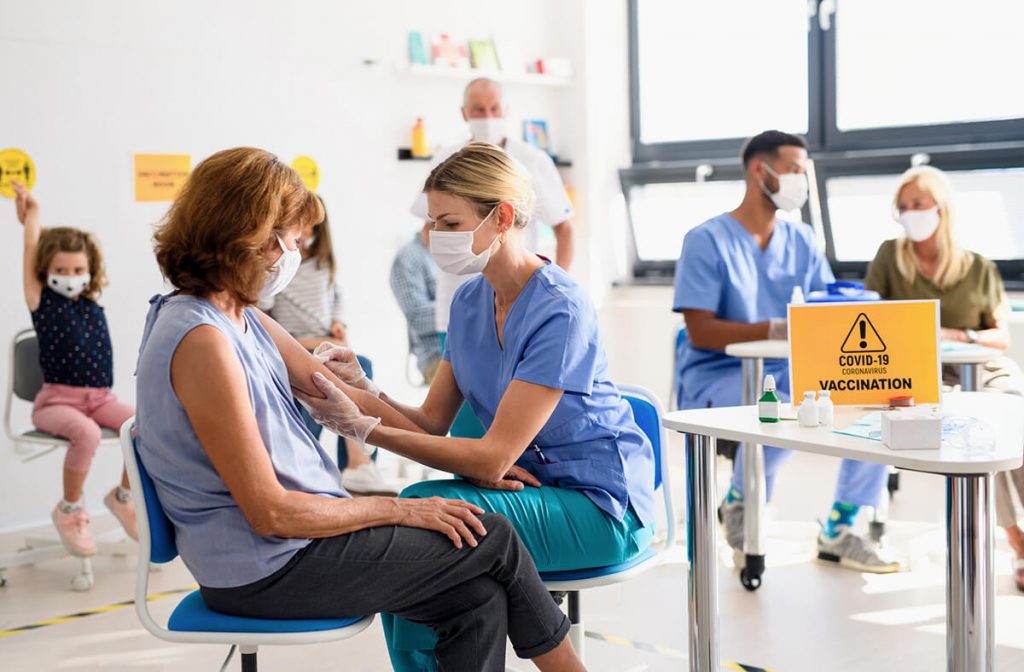 woman getting vaccine