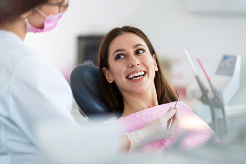 Dentist with patient