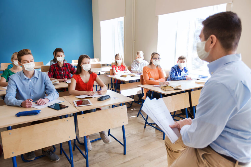 teacher with high school students