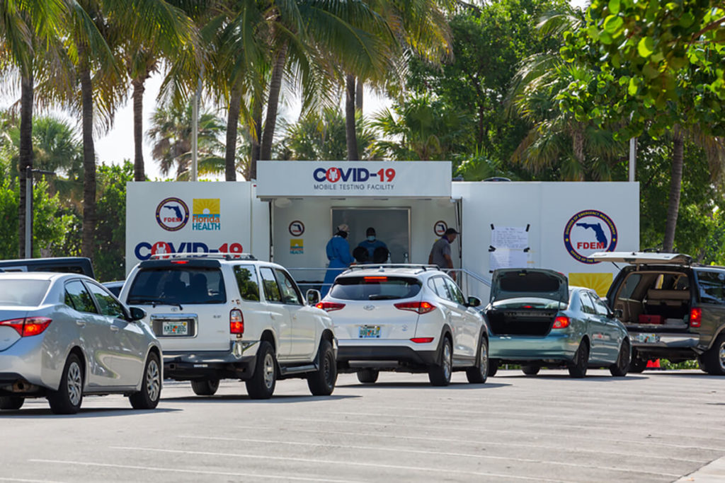 cars waiting for COVID test at drive-thru