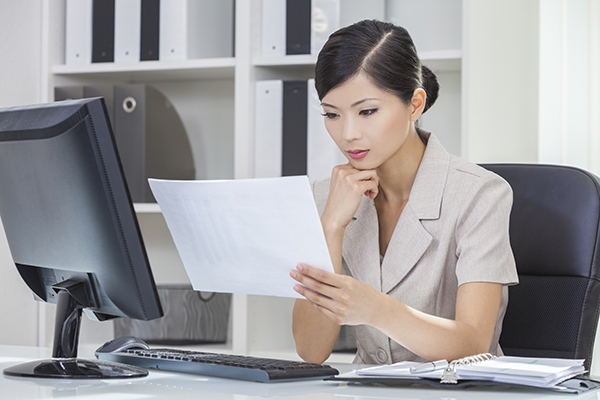 Woman reading contract