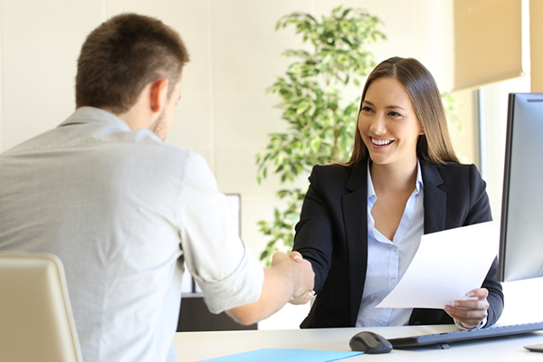 job applicant shaking employer's hand