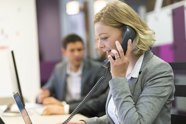 woman on phone in office