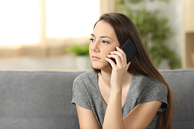 serious woman on phone