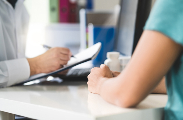 patient and doctor talking