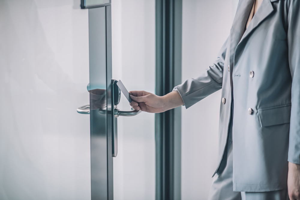 woman opening office door