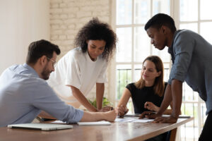 group of workers around a table