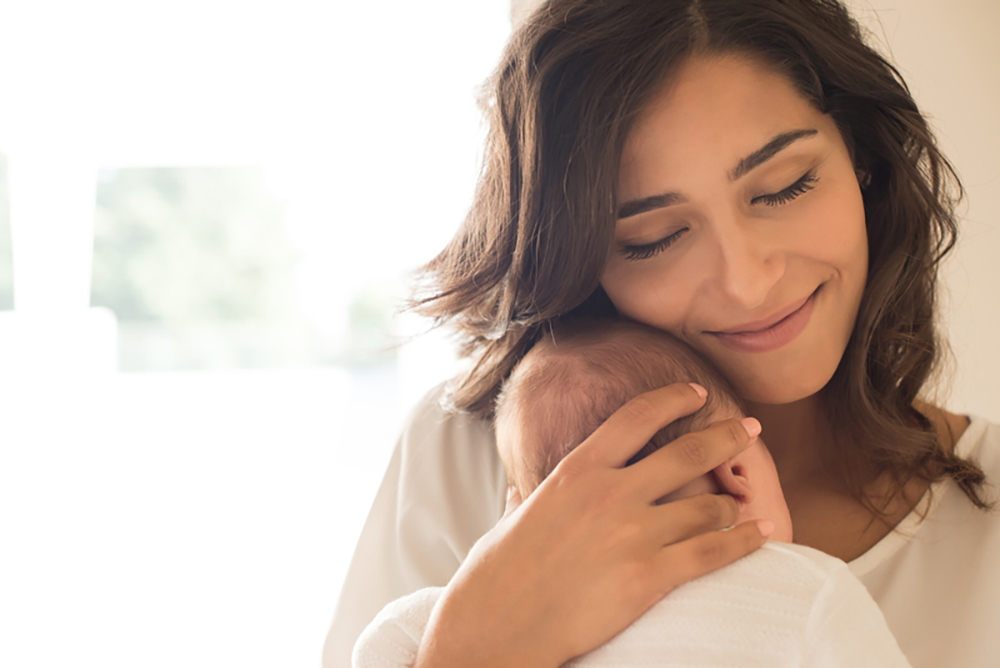 woman with newborn