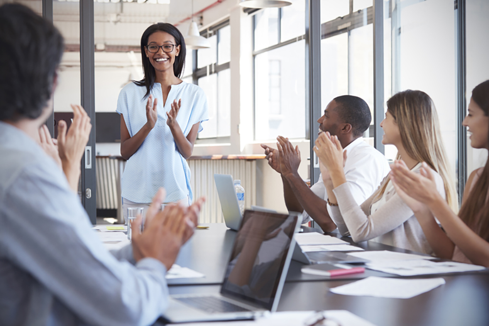meeting with people clapping