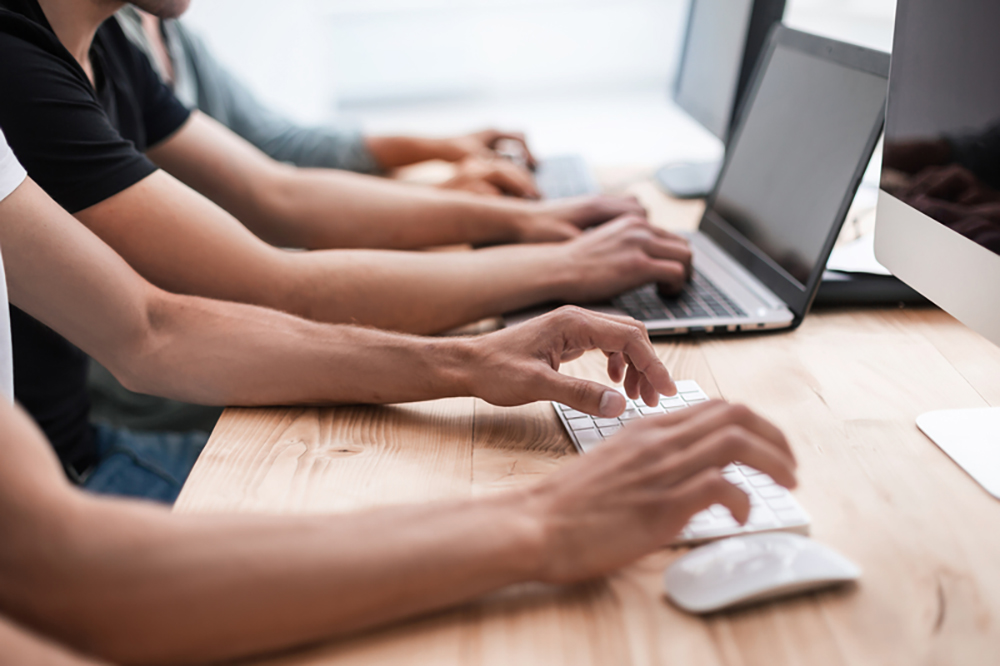 workers on computers